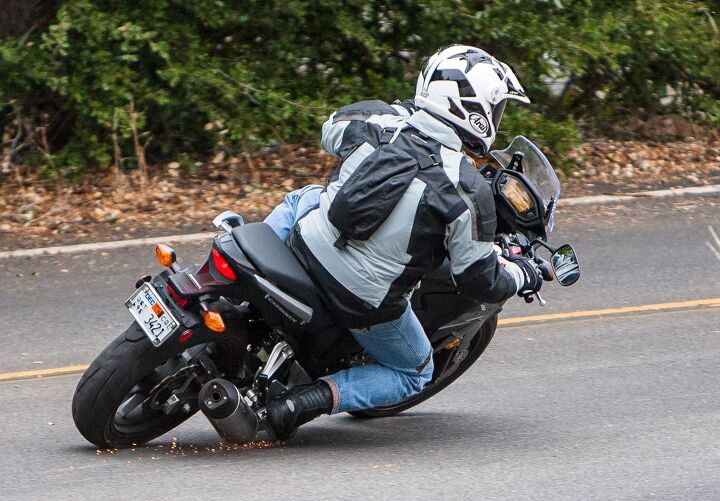 2013 honda cb500x review, The 500X has slightly more cornering clearance than its 500R counterpart but will grind pegs when pushed hard