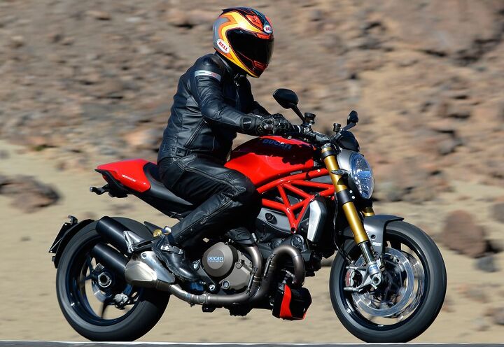2014 ducati monster 1200 s first ride review, No cramped ergos here Dimensionally the Monster 1200 is a bigger more comfortable bike than either the 1100 EVO or S4R