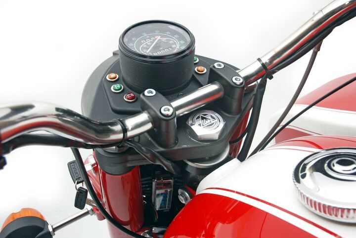 2014 ural solo st review, A new headlight nacelle with a fuel light graces the front of all new Urals as does a new wiring harness with weather tight connectors Replacing the old school friction steering damper is a new 16 position hydraulic unit