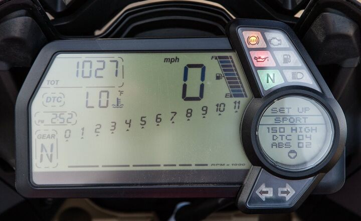 2014 ducati multistrada granturismo review, We ve come to appreciate the clean legible readout of the Multistrada s all digital display Navigation once familiarized is a simple operation Electronic suspension adjustment makes being lazy easy