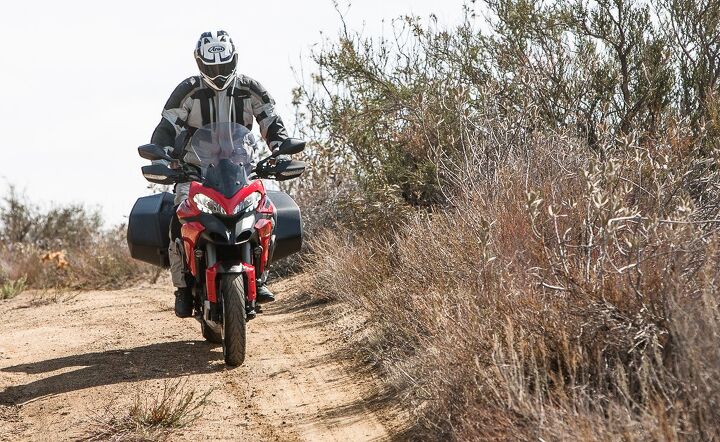 2014 ducati multistrada granturismo review, Must have accidentally spiked the hydro pak with whiskey because taking this 23K 540 pound Italian with street tires off road can be foolhardy Guess we wanted to prove that it can be done but we don t recommend going far off the beaten path