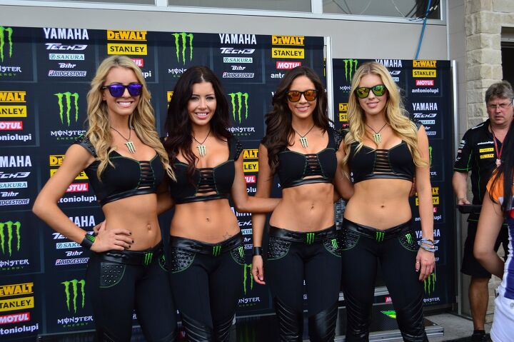 trizzle s take just one of the guys, No trip to a race is complete without a picture of the Monster girls with bonus photobomb by a Tech 3 mechanic