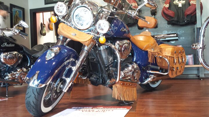 indian motorcycle displays new accessories and apparel, This Chief Vintage is fitted with Indian s Stage 1 Slip On Exhaust 699 99 which also includes an ECU reflash to suit the freer flowing pipes Floorboard decoration will please fringe fetishists