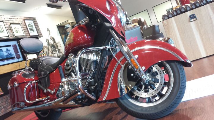 indian motorcycle displays new accessories and apparel, This Chieftain is equipped with Concert Audio Lids 399 99 and the Concert Saddlebag Audio Kit 574 99 The kit s 100 watt amplifier cleverly fits under the saddle so it s not stealing space from the bags