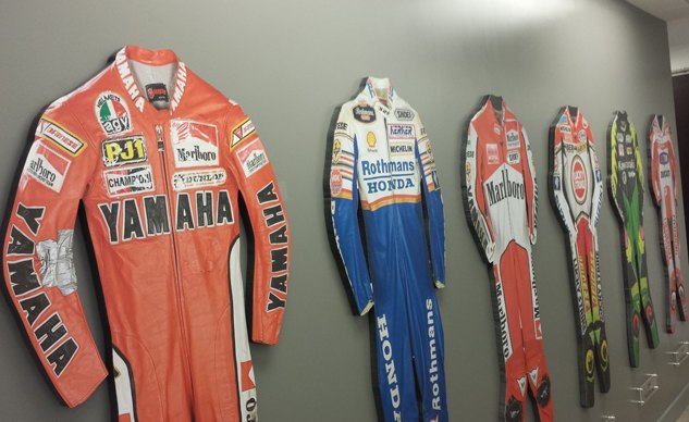 dainese agv opens new hq and warehouse in socal, Dainese Italy has a vault full of leathers dating back to the company s earliest days Here we get cardboard cutouts instead Can you match the leathers to the rider