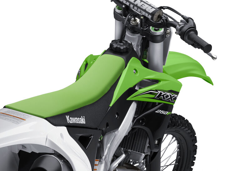 2015 kawasaki kx450f and kx250f preview, The KX250F s slim seat hides its new KX450F style subframe which is narrower and lighter than the 2014 s Naturally all new graphics adorn both machines