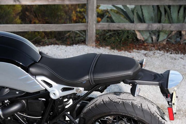 2014 bmw r ninet first ride review, The nineT s seat is quite attractive especially with its hand sewn white stitching and the forged aluminum brackets which support the midsection of the saddle