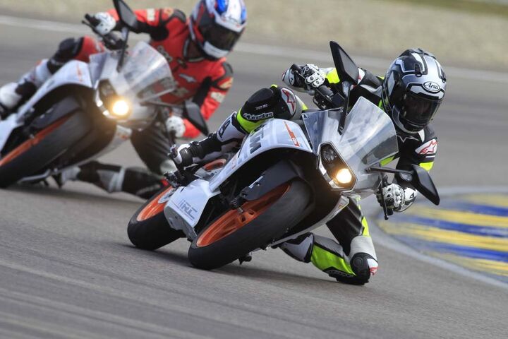 2015 ktm rc390 first ride review video, Do not think that dicing with your buddies on a 40 horse sportbike can t be riotously fun Rich dudes will be able to buy at least four RC390s for the price of a Panigale R