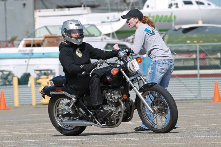 skidmarks motorcycle safety theater, MSF RiderCoach Heidi Burbank coaches a student through a turn Yes she knows the throttle is on the right