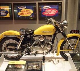 visiting the harley davidson museum, To celebrate its 50th birthday in 1953 H D produced the first of its anniversary medallions to be placed on the fenders of 1954 models like this KH side valve Note also the yellow paint another anniversary edition option for this model