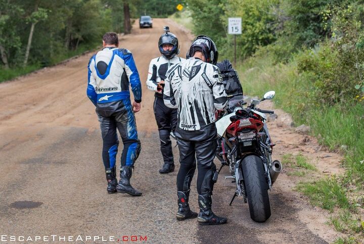 escape the apple part 8 video, The team ponders trekking a dirt road on sportbikes to make it to Guanella Pass one of the many incredible roads in CO