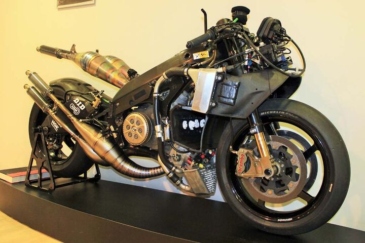 inside yamaha s motogp race shop, This was Carlos Checa s YZR500 from 2001 the final iteration of Yamaha s two stroke GP bikes before transitioning to the four stroke M1 in 2002