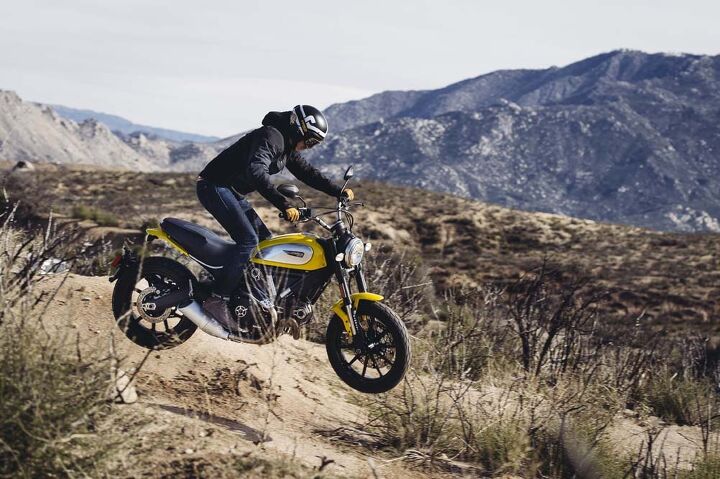 2015 ducati scrambler first ride review, Obligatory Scrambler off road jumping photo Unfortunately that s not me manning the controls