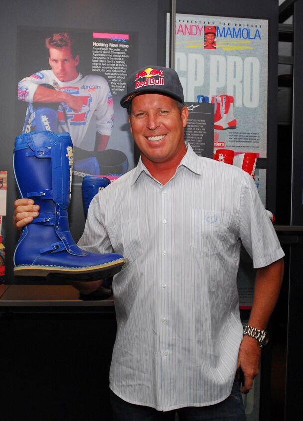 alpinestars 50th anniversary celebration, Former AMA Motocross and Supercross champion Ricky Johnson shows off one of the Alpinestars boots that he helped the company develop during his years as a top level factory racer Johnson spent a lot of time working with Alpinestars to improve its products