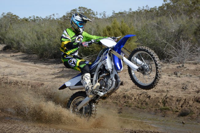 2015 yamaha yz250fx review, Unencumbered by EPA mandates the FX s 44mm Kehin fuel injection is extremely responsive allowing the rider to make the most of the engine s aggressive yet smooth character