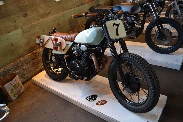 6th annual one motorcycle show, A slick 74 Honda CL 350 by Kick Start Garage with skateboard