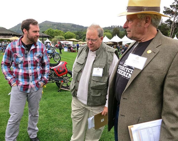 the quail motorcycle gathering 2015 report, Judges Craig Vetter right and David Edwards discuss Jesse Basset s 1950 Norton Dominator