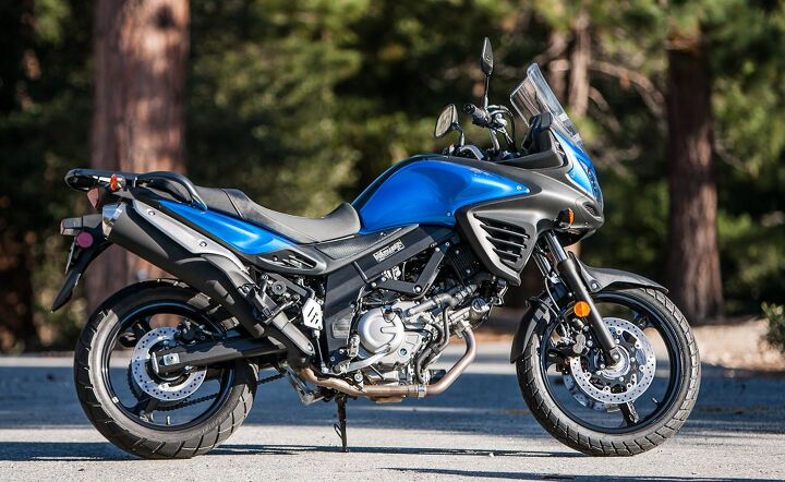 midsize urbane adventurers video, It s fitting that the V Strom is the most likely to become involved in an abusive off road relationship since it s already the most agrarian looking A good skidplate to shield its exposed organs is a necessity as it is on the others
