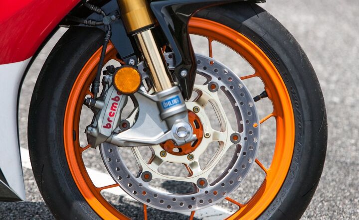 2015 six way superbike street shootout video, hlins and Brembo are two of the best names in the biz and you feel the quality when riding the CBR but Duke makes a good point No forged wheels on a 17k Honda