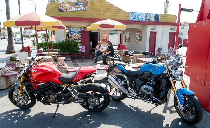 kulture klash bmw r1200r vs ducati monster 1200s, Storied German heritage in LA No problem The Weinerschnitzel on PCH in Wilmington is the very first one dating all the way back to the mid 20th century 1961 As you can see this one adheres to the classic Boxer engine architecture with its drive thru bisecting the two horizontally opposed halves of the structure Coincidence There are no coincidences in Deutschland mein Herr Tom went with the grilled bratwurst Evans and I with the bacon chili cheese dog Sadly this Oktoberfest is beer free Just as well as we have a long day s ride ahead of us
