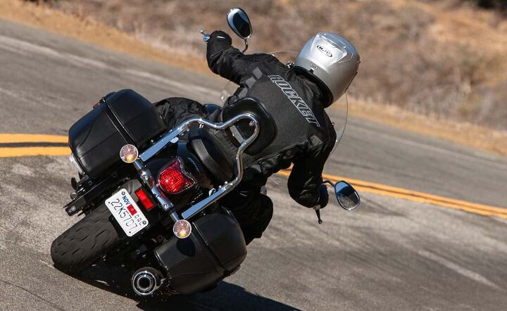 2016 kawasaki vulcan 900 classic lt vs star v star 950 tourer comparo, Any time the road curved the Star s sparks were sure to fly The rear suspension doesn t like bumps either
