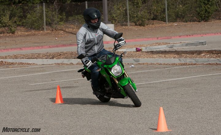 battle of the 125cc ankle biters part 1, Agility is the Kawasaki Z125 Pro s biggest asset If sportbikes are in your future consider learning the ropes on the Green Machine