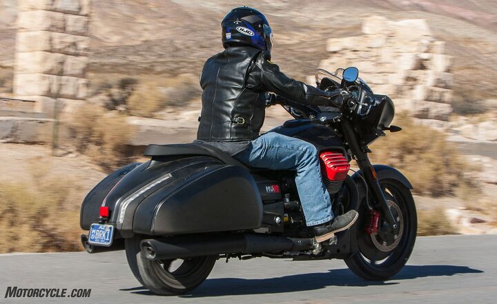 baggers brawl, The MGX 21 handles well at speed but suffers from awkward steering at parking lot speeds The Guzzi s shapely derriere is responsible for the small internal size of the saddlebags