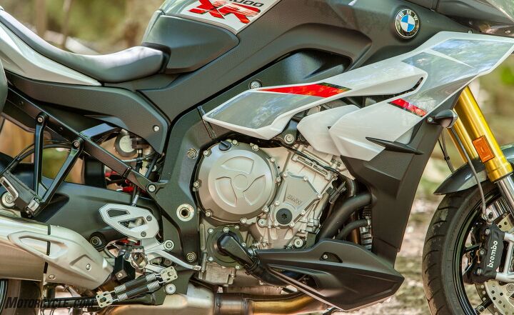 bmw s1000xr vs ktm 1290 super duke gt vs mv agusta turismo veloce, The S1000XR 999cc Four is still a buzzy little thing but new and improved rubber mounts for the bars absorb much of that buzz Get over that and the four banger really moves And it sounds great too