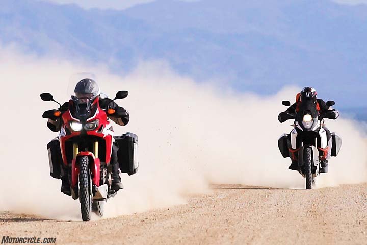 2017 honda crf1000l africa twin vs ktm 1090 adventure r, Getting in a little Bonneville action on a dry lakebed outside of Las Vegas the Honda was able to accelerate right with the KTM until Editorial Director Sean Alexander switched the 1090 Adventure R to Sport Mode Then the KTM delivered superior drive and was able to fly right past the Honda Both machines are perfectly comfortable at top speeds in excess of 110 mph on smooth dirt