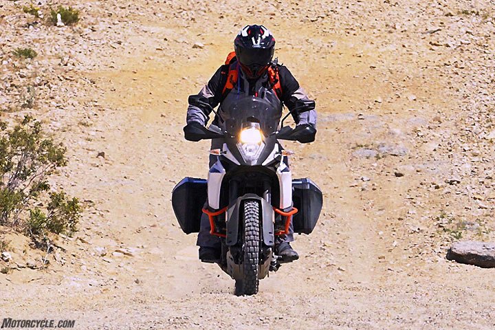 2017 honda crf1000l africa twin vs ktm 1090 adventure r, The KTM 1090 Adventure R s steel trellis frame and WP suspension components are awesome in the off road environment The 1090 is supremely stable and its fully adjustable inverted fork and PDS shock deliver an excellent combination of compliance and control in rough terrain without being harsh when pounding the pavement