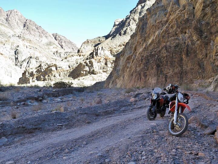 whatever asses over teakettle, Titus Canyon was carved out by an ancient river and at one point grows so narrow the whole road through is one way east to west