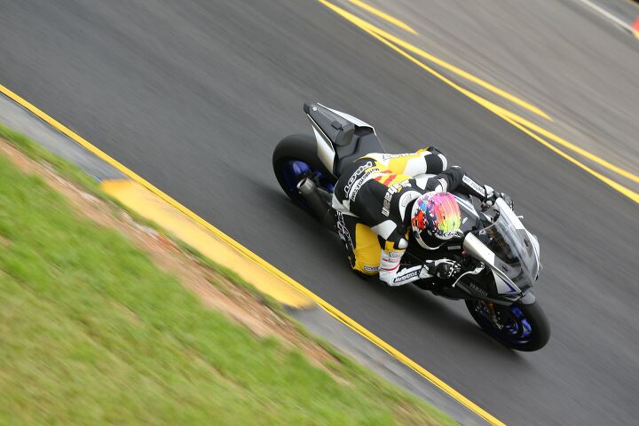 2015 yamaha yzf r1 yzf r1m first ride review video, With the R1M and its 200 series rear one gets more confident carrying greater lean angles Ohlins Electronic Racing Suspension helps settle the bike in varying conditions