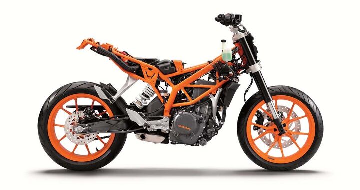 2015 ktm 390 duke first ride review video, Robotically welded tubular steel trellis frame 43mm inverted fork aluminum swingarm and standard antilock brakes with radially mounted front caliper Not what s usually expected from a bike with a modest 4 999 MSRP