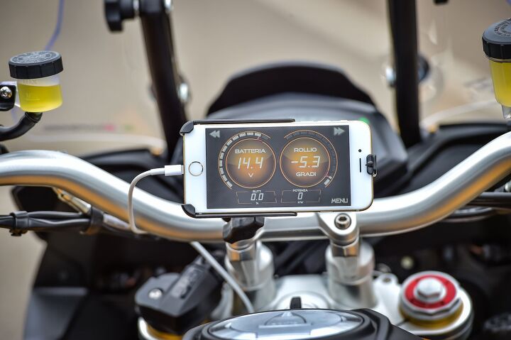 2015 aprilia caponord rally first ride review, With the Aprilia Multimedia Platform you can convert your smartphone into a supplementary gauge display A nice feature for the tech savvy