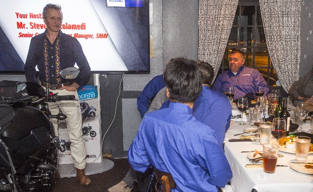tomfoolery dinner at le schwantz, Schwantz addresses the room of journalists and Suzuki employees at Austin Land and Cattle restaurant the night before our ride