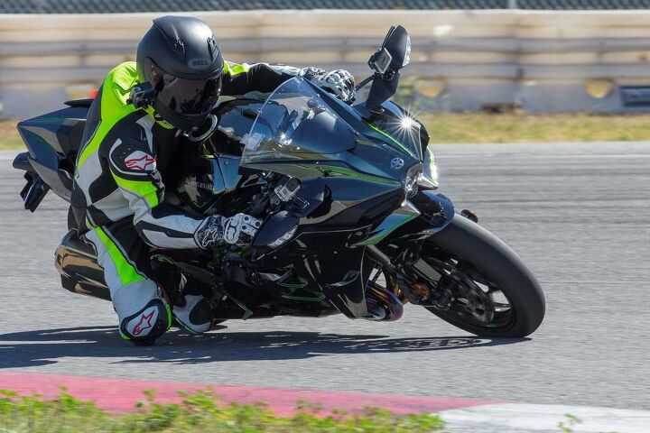 2015 kawasaki ninja h2 first ride review video, In corners it s best to carry a gear high and rely on supercharged torque to carry you out rather than dealing with abrupt throttle response at high revs In the simplest terms the H2 steers like a heavy ZX 10R or a very light ZX 14R although there s a lot more to the equation than just mass