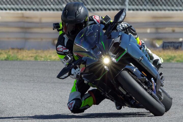 2015 kawasaki ninja h2 first ride review video, Two massive intakes flanking the H2 s LED headlight feed air to the supercharger mounted behind the 998cc engine s cylinder bank LED lighting also resides in the mirrors and tail lights