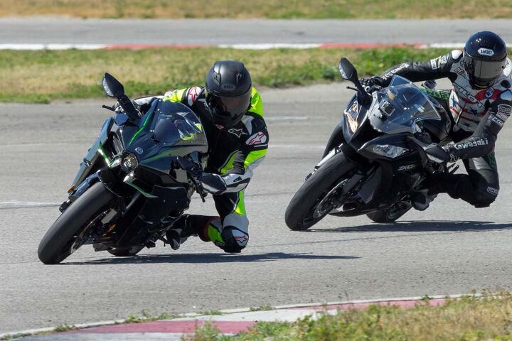 2015 kawasaki ninja h2 first ride review video, This ZX 10R was serving only as a camera platform The H2 s ergos are slightly more relaxed than a 10R