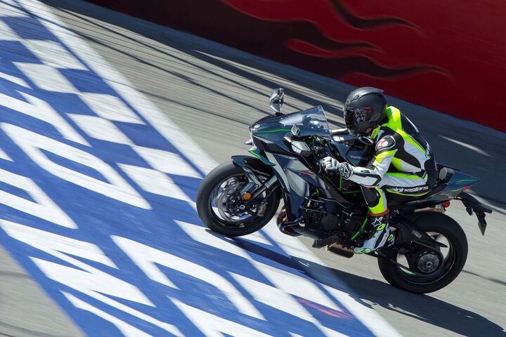2015 kawasaki ninja h2 first ride review video, Pushing past 170 mph The rear of the seat uses adjustable hip supporting padding that helps keep the rider from becoming detached from the H2 under acceleration