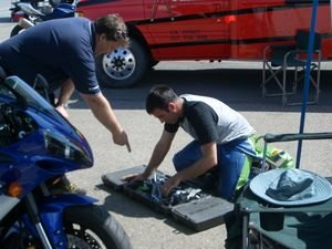 church of mo 2005 open supersport shootout, Chuck Hand me that socket please Gabe Errr I think I ve got some 20 weight ball bearings here Chuck Do you even know how to change a tire Gabe Sure no problem 220 230 whatever it takes
