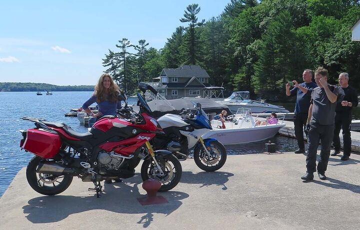 2015 bmw s1000xr first ride review, Lake Rosseau up there in Ontario Canada isn t such a bad place after all once the rain stops the lake thaws and the mosquitoes retreat This one s the accessorized out model complete with Akrapovic pipe hard bags and Big Hair