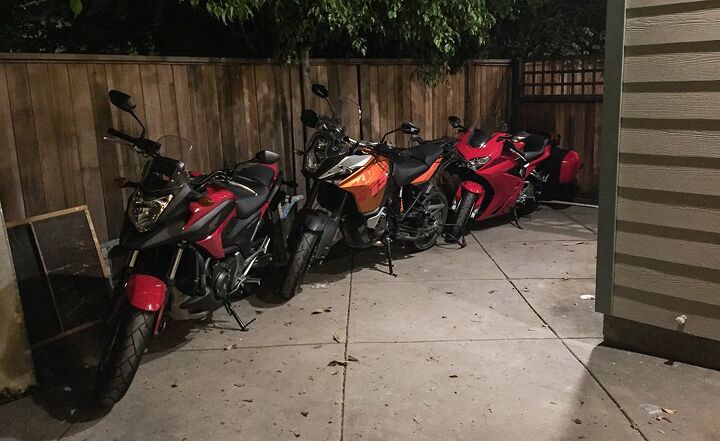 evans off camber the question of moto monogamy, This is what my driveway frequently looks like when I need to use my garage for wrenching