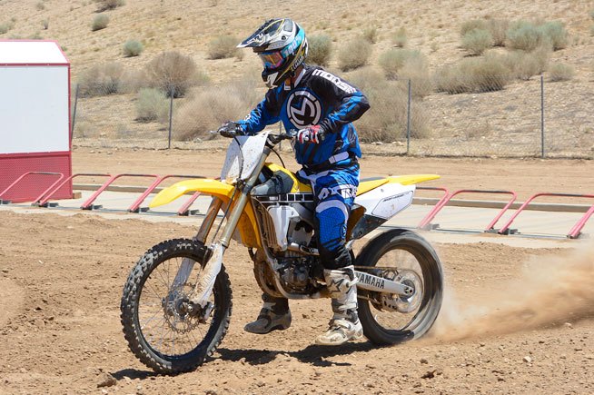 2016 yamaha yz450f review, Yamaha s new Launch Control System works well on slippery concrete starting surfaces The system is activated via a button on the handlebar Once in use it reverts back to the main engine map as soon as the rider hits third gear