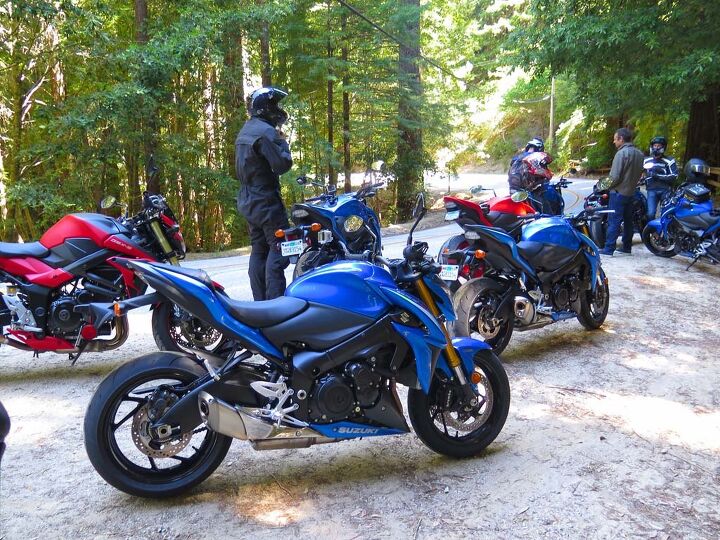 2016 suzuki gsx s1000 gsx s1000f first ride review, The road to Alice s Restaurant is paved with good inventions The red bike at left is Yoshimura s GSX S750 rolling test bed and the red one up front is its GSX S1000 The stocker gets the same Metallic Triton Blue as the MotoGP bikes the nicest paint I ve ever seen on a Suzuki I think
