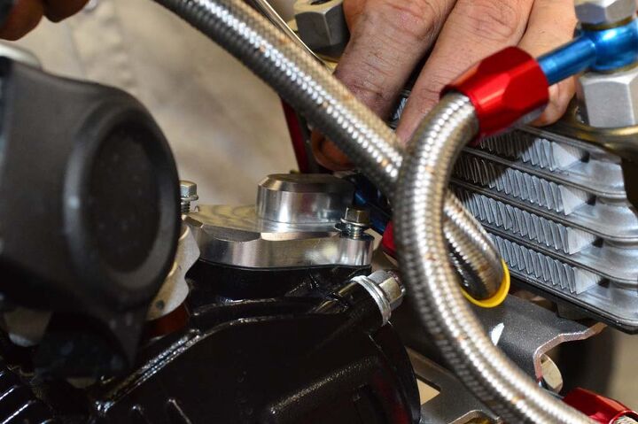building a honda grom roadracer, The supplied billet valve cover simply bolts into place using the supplied hardware Clearance between the radiator and AN fitting can be a little tight for a box end wrench Less of an issue with an open end