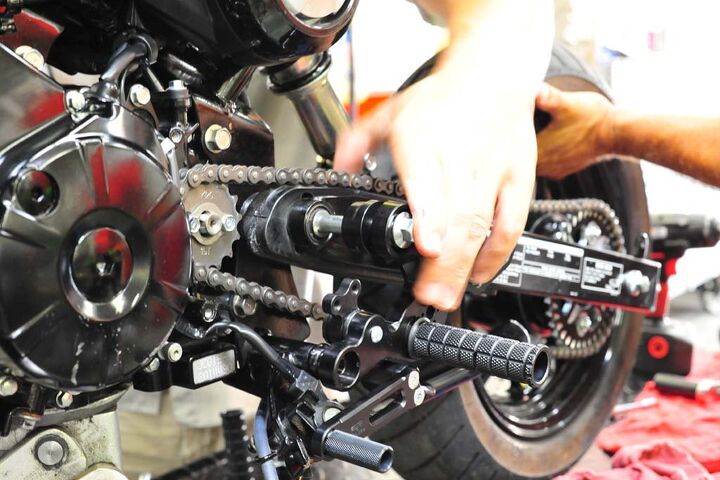 building a honda grom roadracer, Installation of the rearsets is relatively simple thread the long bolt through the shift side then the swingarm then the rear brake side Then tighten top and bottom bolts to factory specs