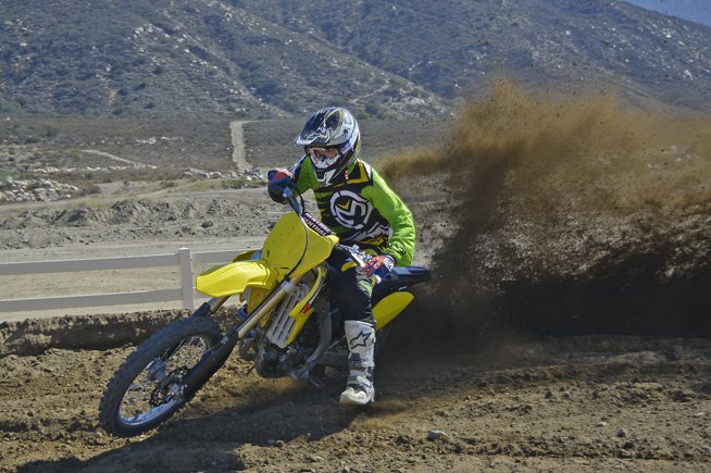 2016 suzuki rm z250 review, The RM Z doesn t bowl you over with explosive power Its power persona is more smooth and linear There s still plenty of low end and mid range power to shred berms with but the Suzuki prefers to be revved hard