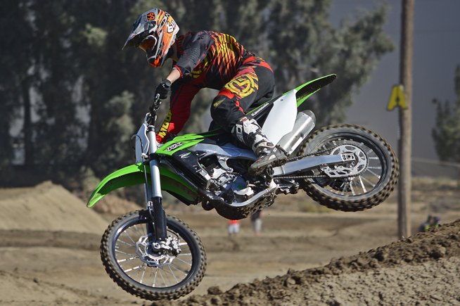 2016 kawasaki kx250f review, Throttle response through the KX s dual injector Keihin Digital Fuel Injection system is excellent which makes it easy to seat bounce and pop over a jump that may be located right out of a corner