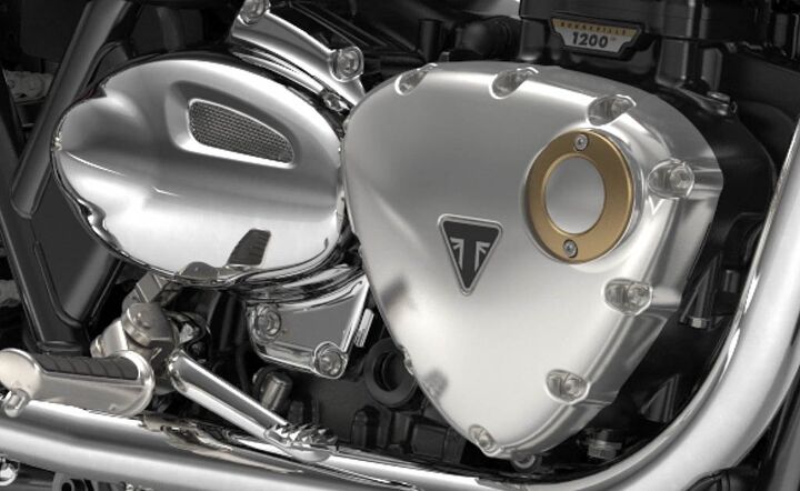 triumph announces three new engine configurations and five all new models for 2016, The only hint that the cooling system s expansion tank is behind the countershaft cover is the small sight glass on the bottom front of the cover