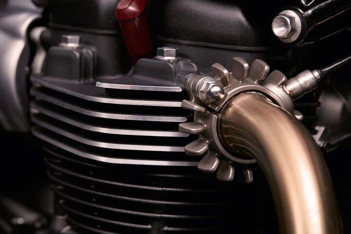 2016 triumph street twin, This oxygen sensor tucked away next the the exhaust manifold provides an example of how Triumph disguises technology